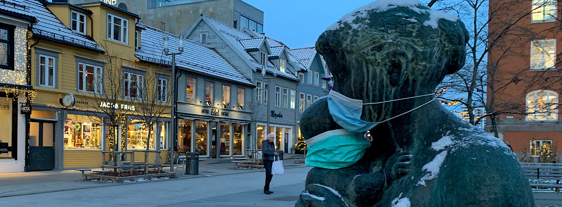 Masked statues in Tromsø, Norway during the polar night.