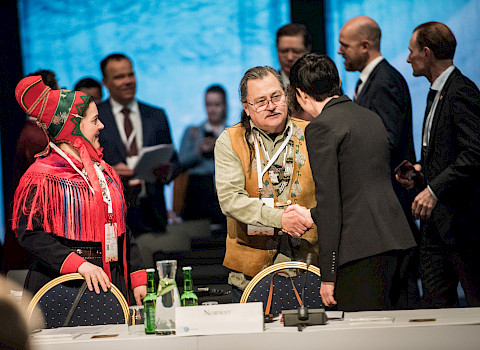 Arctic Council Ministerial meeting in Rovaniemi, Finland, 2019. Then Foreign Minister of Norway, Ine Marie Eriksen Søreide, greets Chief Gary Harrison from the Arctic Athabaskan Council